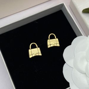 Balenciaga Bag Stud Earrings In Gold