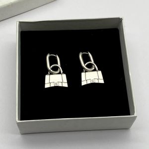 Balenciaga Bag Pendant Hoop Earrings In Silver