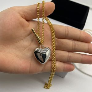 Balenciaga Heart Pendant Necklace In Gold/Silver