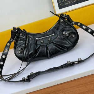 Balenciaga Small Le Cagole Shoulder Bag In Embossed Leather Black