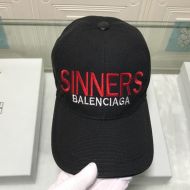 Balenciaga Logo Embroidered Cap In Black/Red